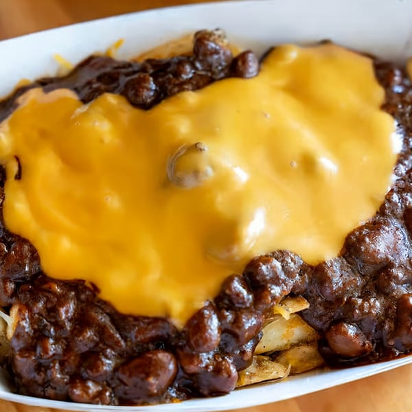 El Capitan's chili cheese fries, topped with melted yellow cheese and hearty chili.